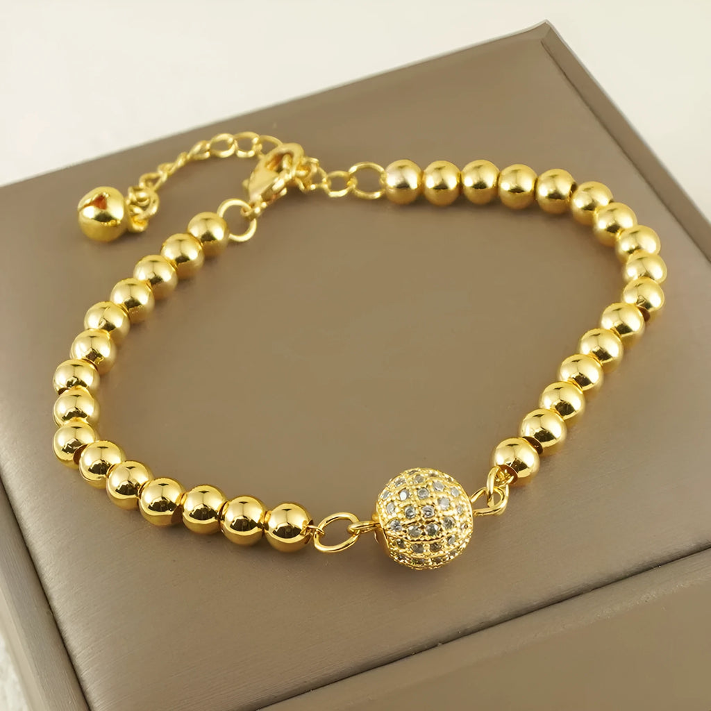 Copper bracelet with zircon beads and heart clasp in Arabic style design