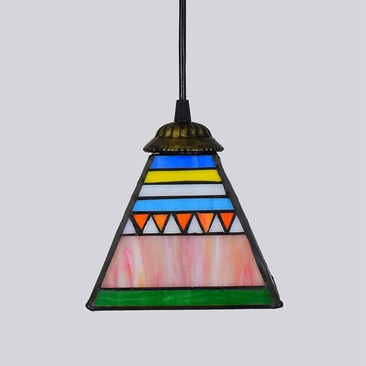 Small art stained glass droplight pendant with coloured shade hanging from ceiling.