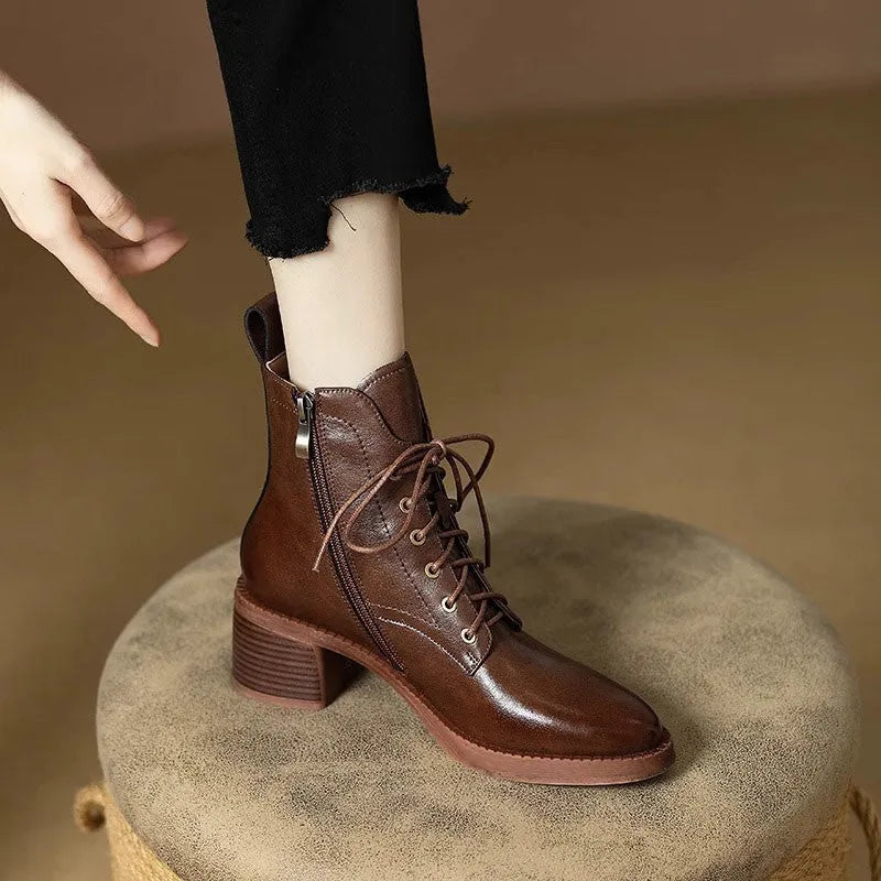 Women's black pointed-toe short tube boots with 13cm sock length and artificial PU upper