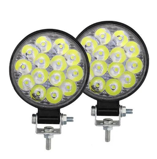Mini round aluminium LED work light with white light, 42W power and IP67 waterproof rating.