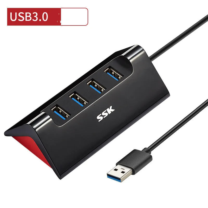 Black USB expansion dock with four ports and Micro USB connection in compact ABS housing