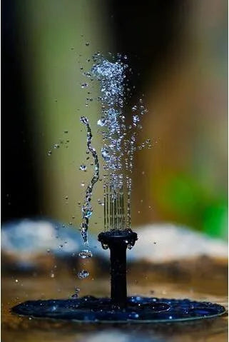 Black solar panel fountain pump with multiple nozzles for garden ponds and birdbaths.