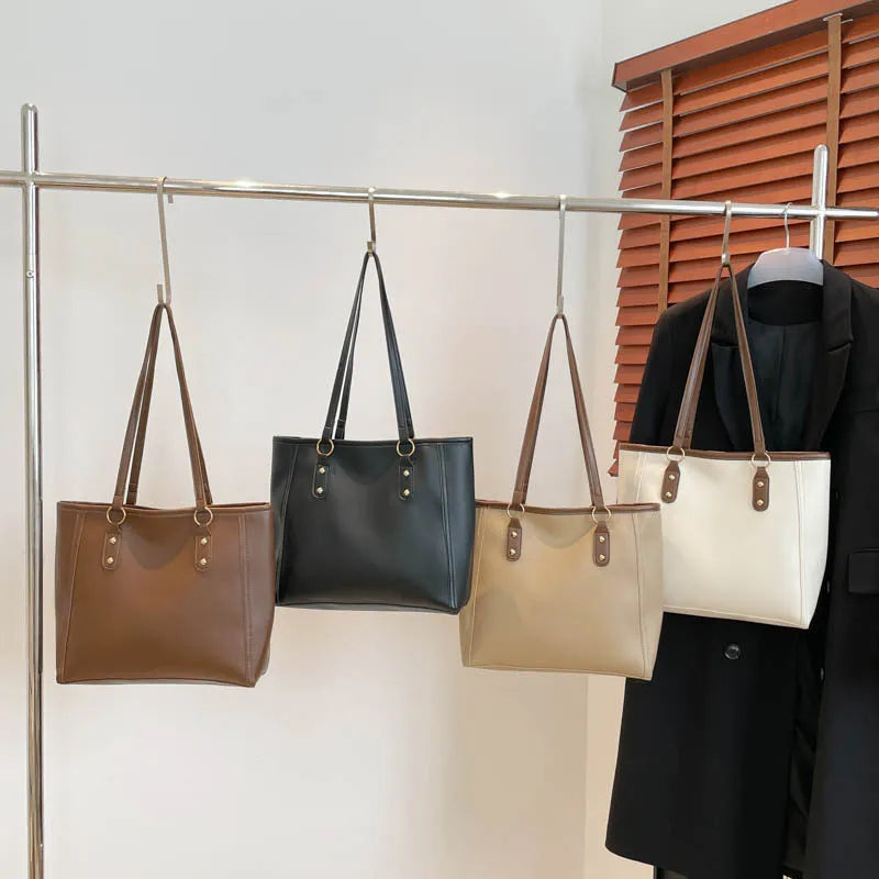 Square black PU underarm shoulder bag with a sandwich pocket design shown from the front.