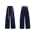 Men's dark blue cotton straight-leg jeans with loose fit, showing 3D cutting and belt stitching detail.