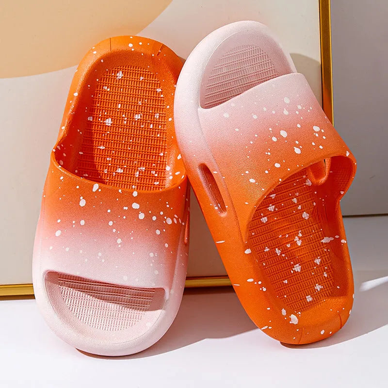 Gradient coloured children's PVC summer slippers with non-slip soles in blue, yellow, green, orange, pink, or black.