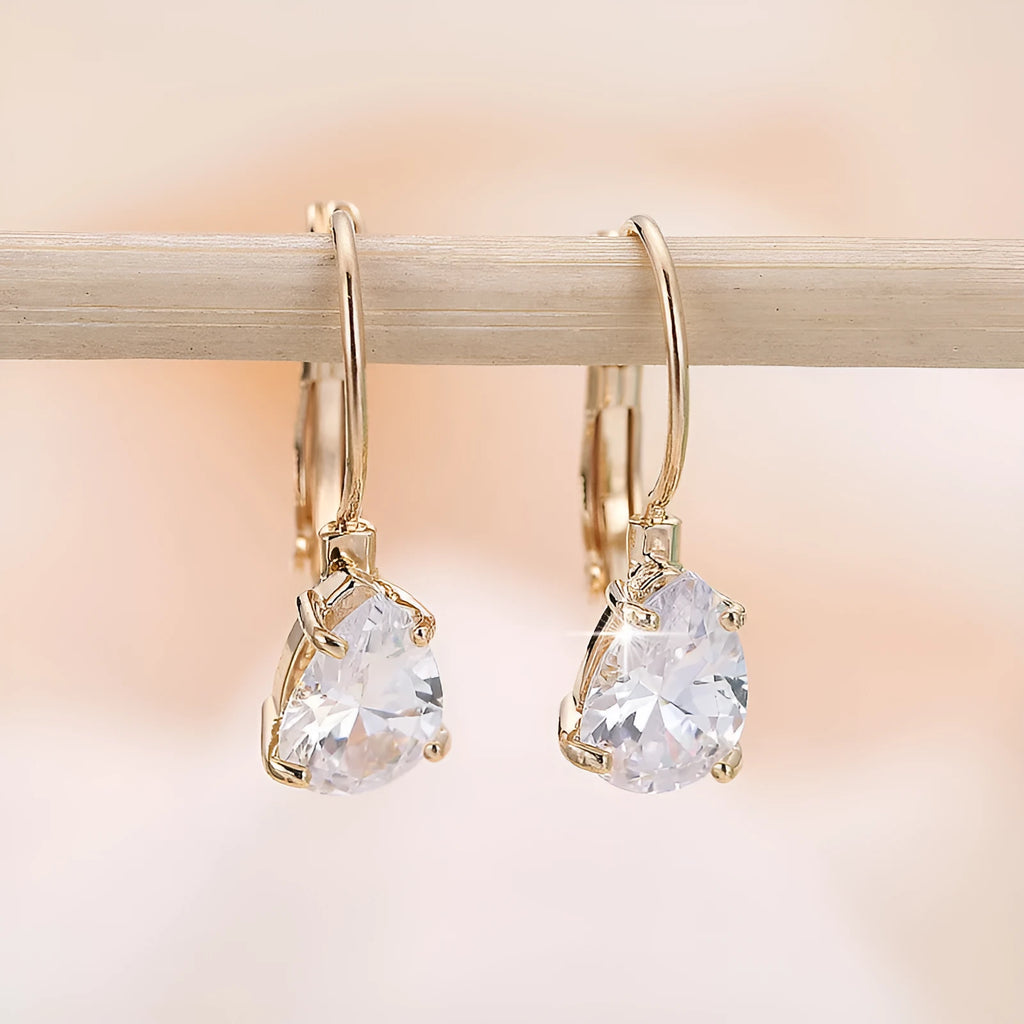 Women's metal drop earrings with gemstone accents in gold or platinum plating options