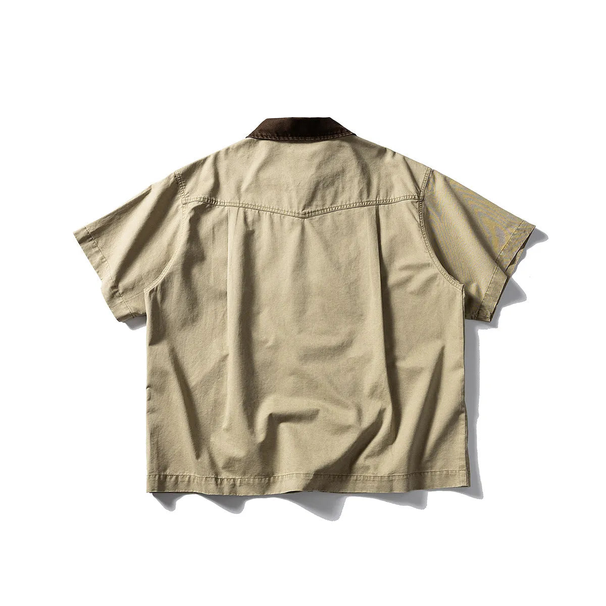 Men's washed cotton overall shirt with short sleeves in loose fit cardigan style, shown in khaki colour