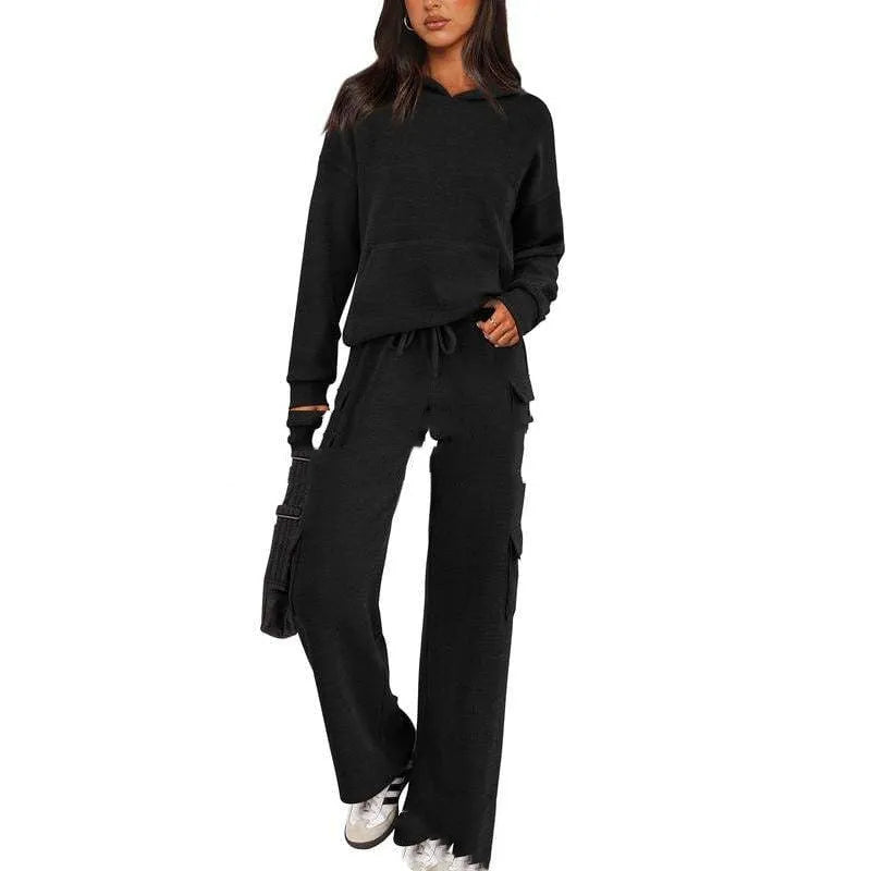 Women's polyester leisure sports suit with regular sleeves and matching trousers in multiple colour options