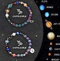 Two natural stone beaded bracelets laid out, each featuring designs for different zodiac signs.