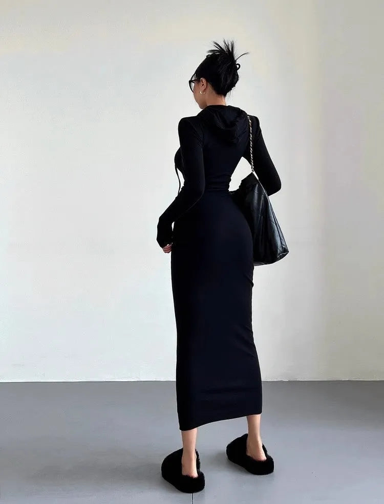 Women's long sleeve hooded sheath dress in grey with over-the-knee length and high waist.