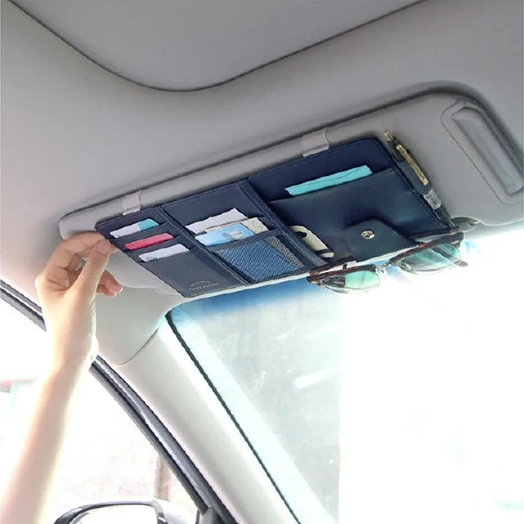Car sun visor clip in PU leather measuring 30x14cm, shown in black, with multiple storage slots