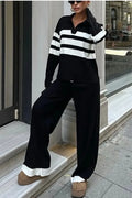 Women's black and white striped knitted two-piece set with polo collar top and trousers