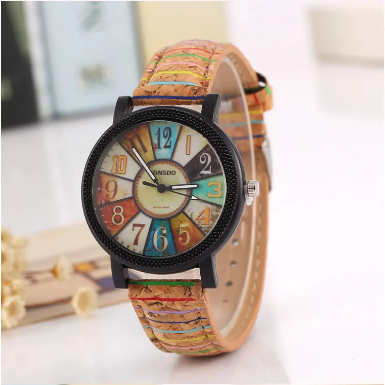 Women's vintage-style quartz watch with brown leather strap and 37mm round dial