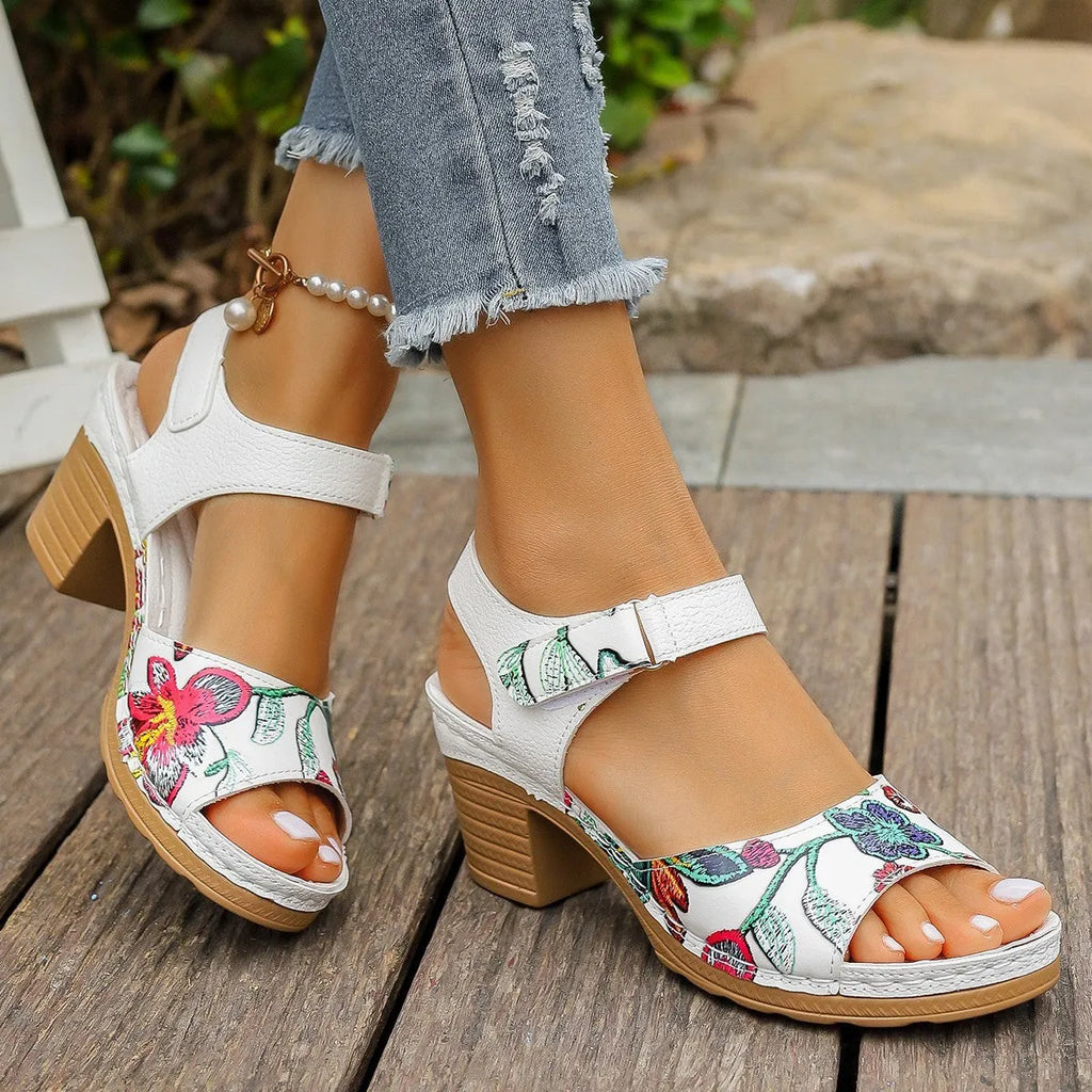 White women's high heel sandals with velcro buckle strap and rubber sole