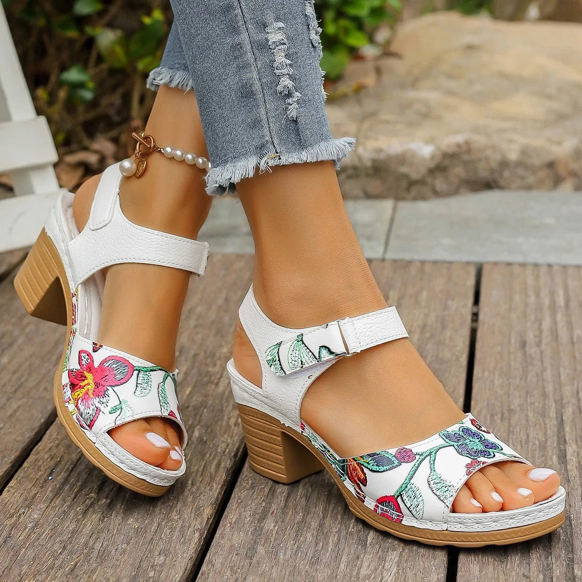 White women's high heel sandals with velcro buckle strap and rubber sole