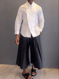 White asymmetric front shirt with black pleated pants women's co-ord set