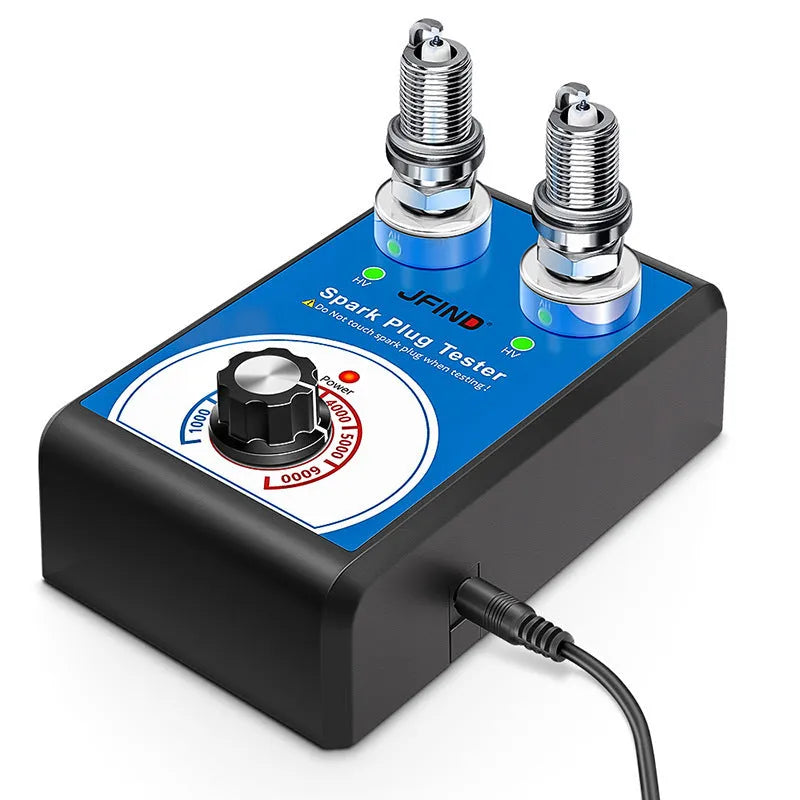 Car ignition fault detector diagnostic tool for testing spark plugs on a workbench.