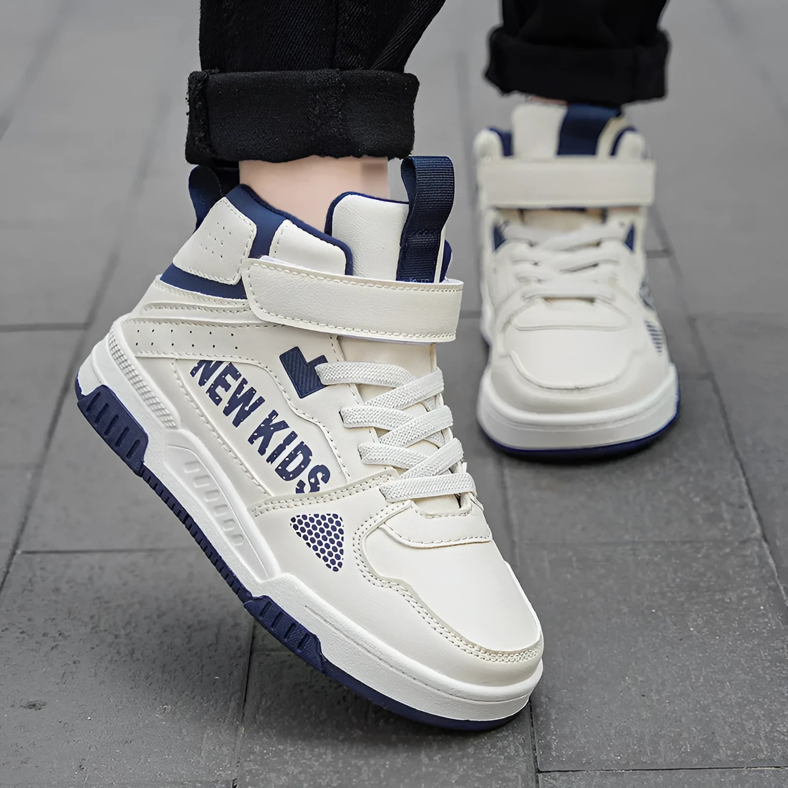 Children's beige green street sneakers with a buckle closure, shown on a white background.
