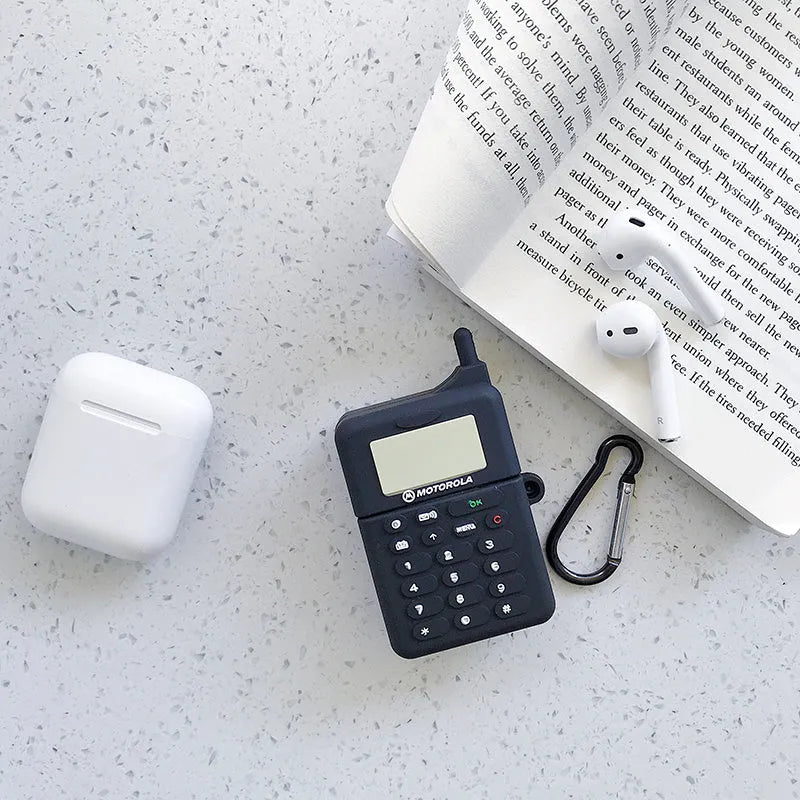 Green silicone case for AirPods 1/2 with a cartoon animal design on a white background.