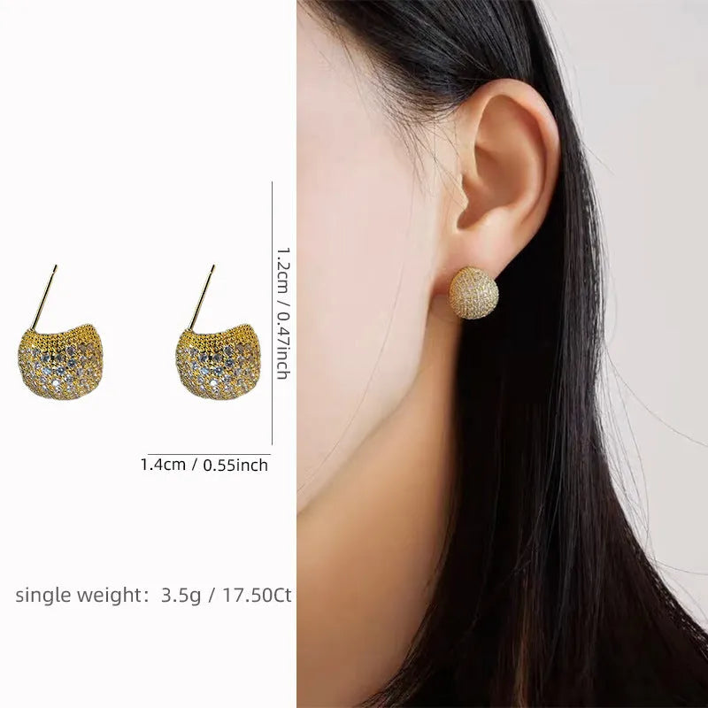 Geometric drop-shaped women's earrings with full diamond little golden beans construction in gold colour
