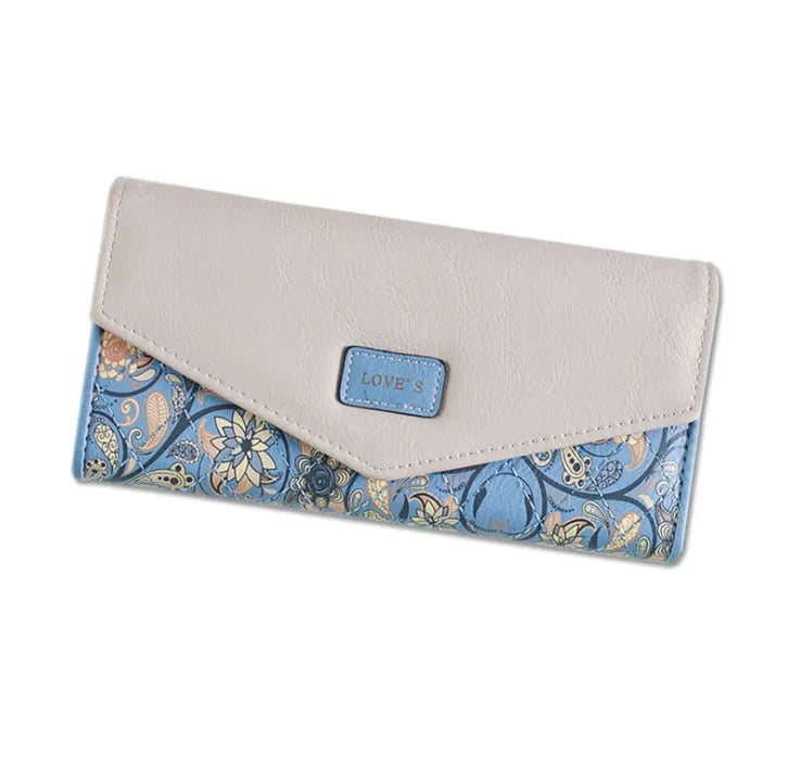 Open trifold women's wallet showing card slots and buckle closure in one of five colours.