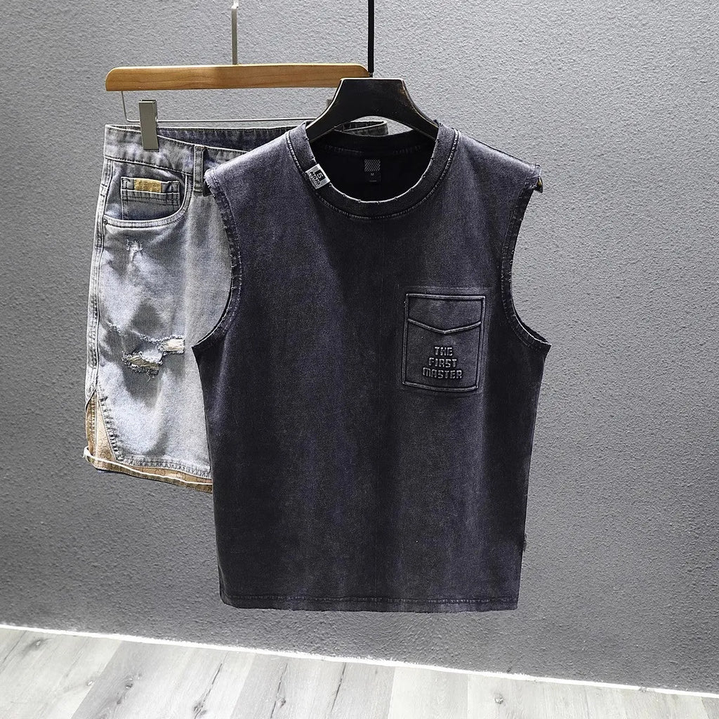 Men's solid colour cotton sleeveless t-shirt in loose fit, shown in white and black.