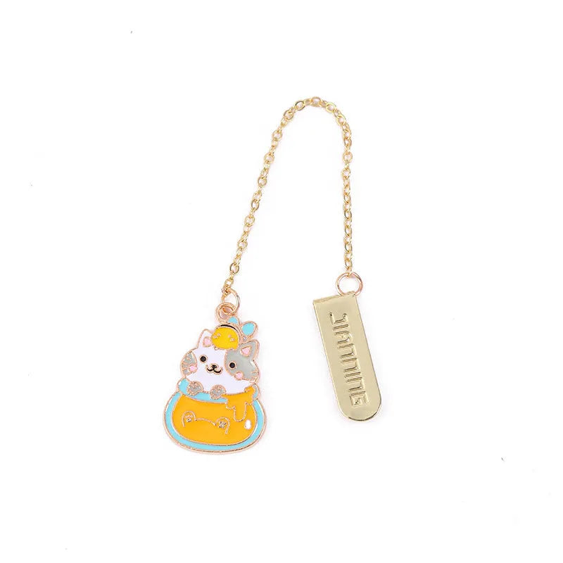 Metal cat pendant bookmark showing one of four cartoon designs: Strawberry Cake, Fruit Roll, Cherry Sleeping, or Yellow Fortune Bag cat.