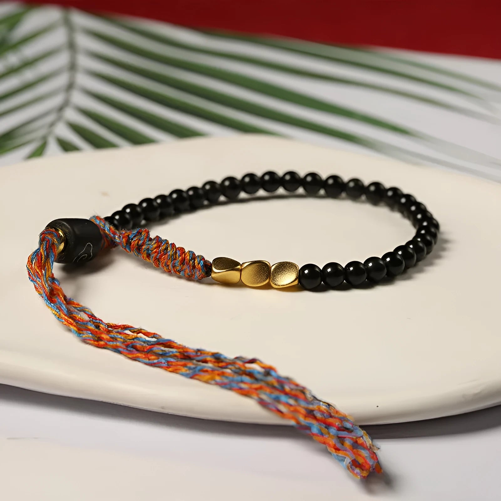Hand-woven obsidian bracelet strap showing textured detail and 4mm width