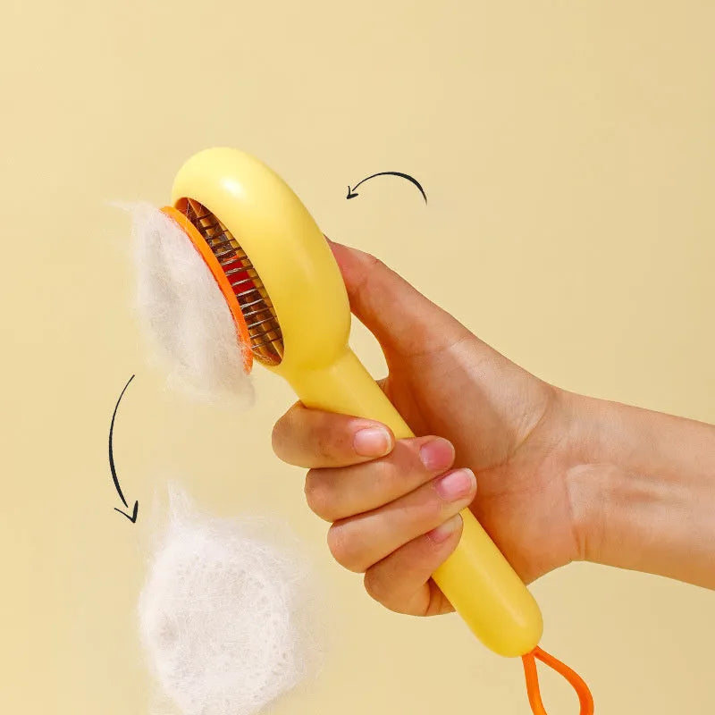 Small yellow plastic comb with needle bristles for pet hair removal on cats and dogs.
