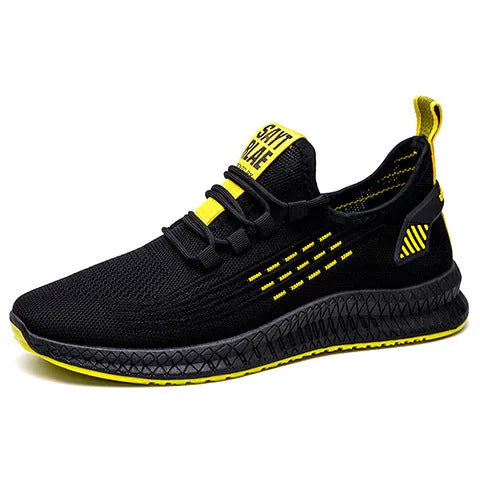 Men's black casual trainers with cross-strap design over striped pattern and Flying Weave fabric upper