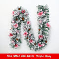 PVC Christmas rattan garland with flocking in golden colour, draped decoratively.