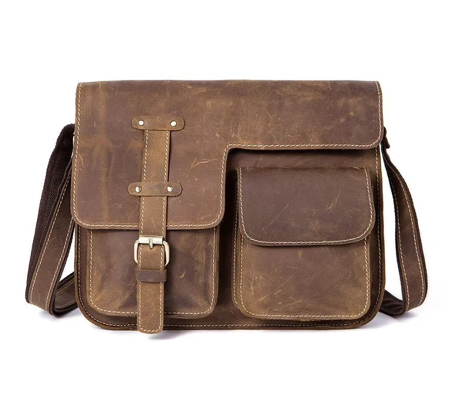 Leather vintage messenger bag in brown colour with adjustable strap and flap closure