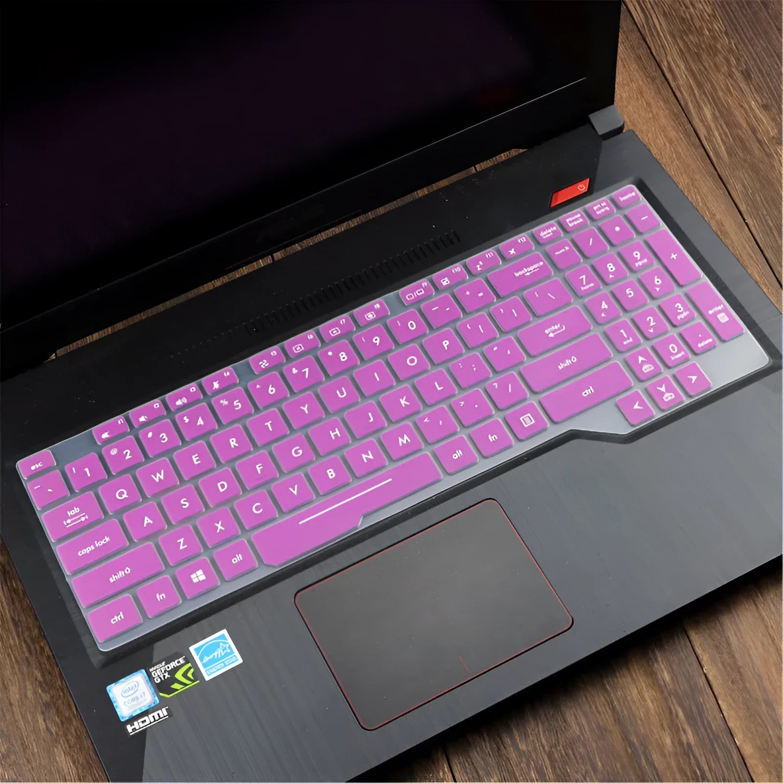 ASUS Flight laptop keyboard protective film cover shown in gradient blue on a laptop