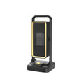 Black HQ-500A PTC ceramic desk heater with control knob on a desktop.