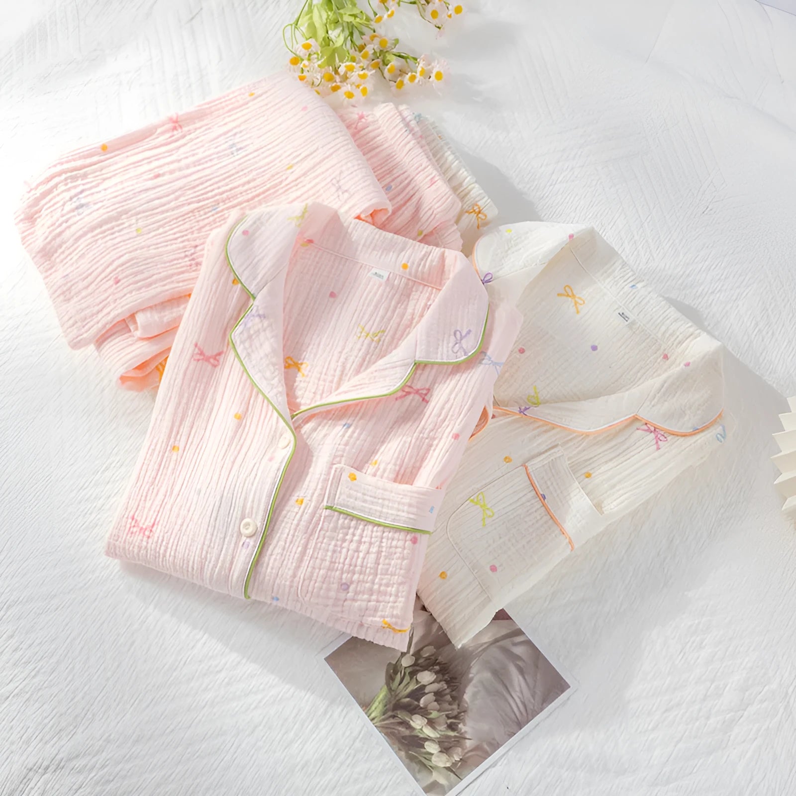 Women's beige cotton pajama suit with long sleeves and trousers for homewear.