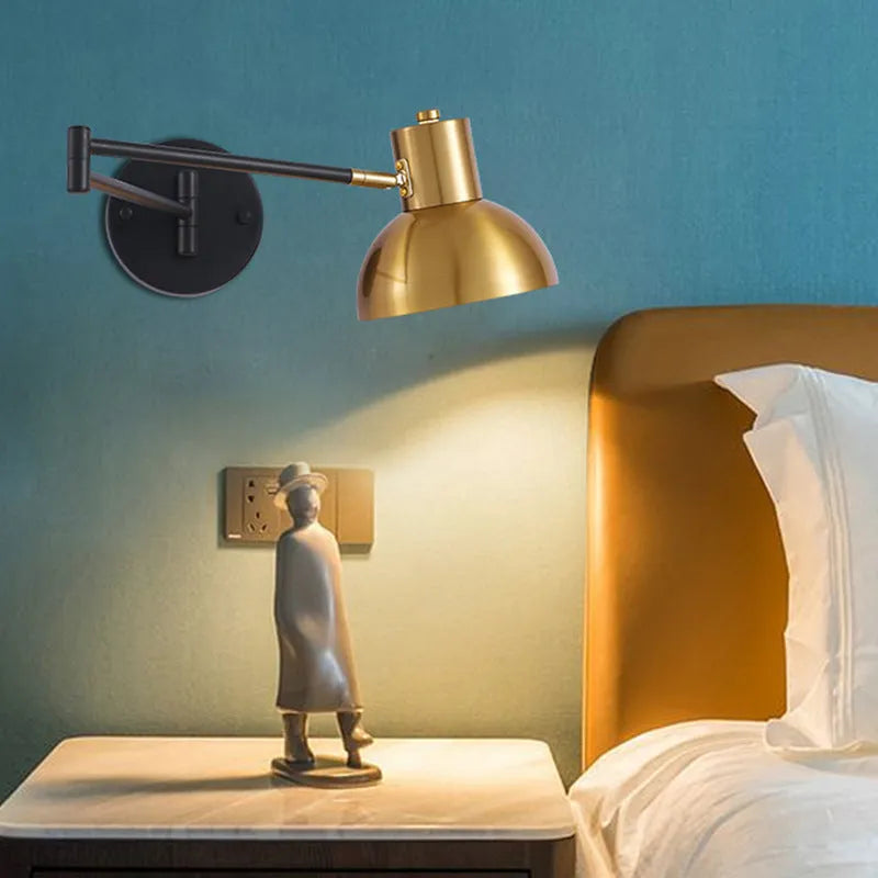 Modern minimalist double-section rocker arm wall lamp mounted on a wall with adjustable arms extended.