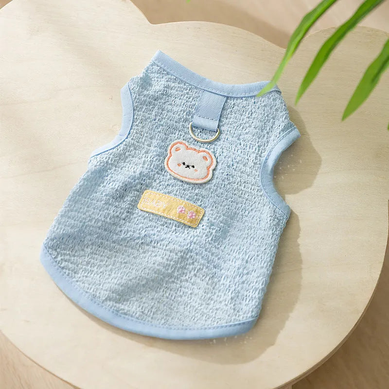 Green cat jumper with bear patch design showing breathable knitted fabric