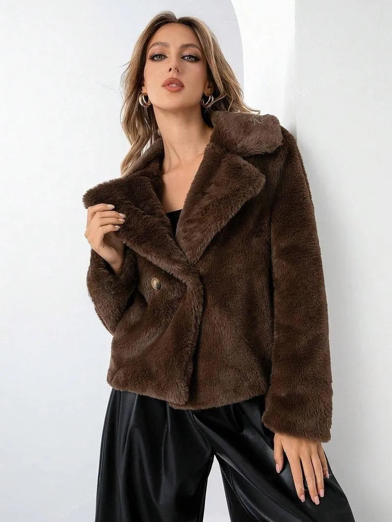 Women's short loose artificial fur coat in rose red colour with regular sleeves.