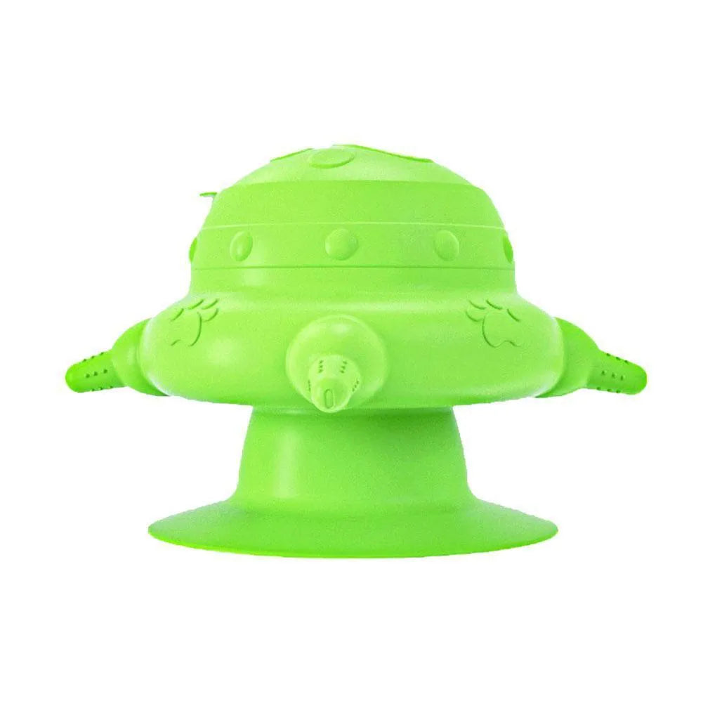 Pink silicone pet nursing device with milk bowl and four pacifiers for puppies and kittens.
