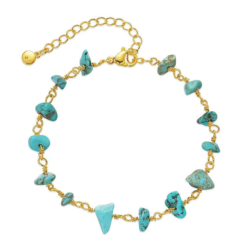 Geometric women's bracelet with natural gravel turquoise stones and crystal accents on gold plated copper.