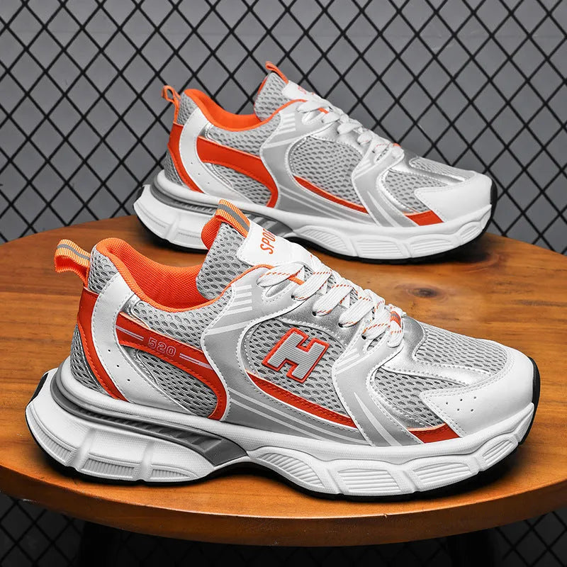 Men's solid-colour mesh running shoes with round toe and plastic sole.