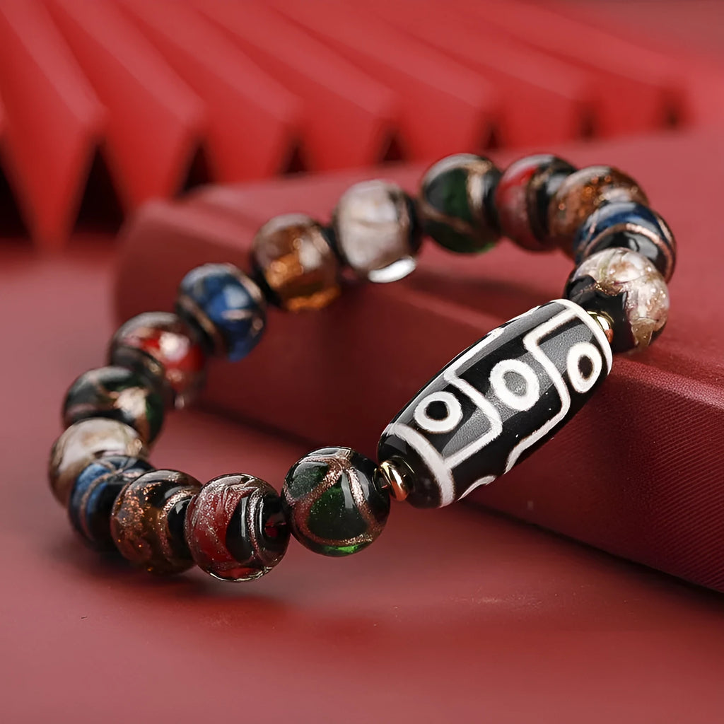 Ancient Chinese style coloured glaze bracelet with snake motif and multi-colour beads