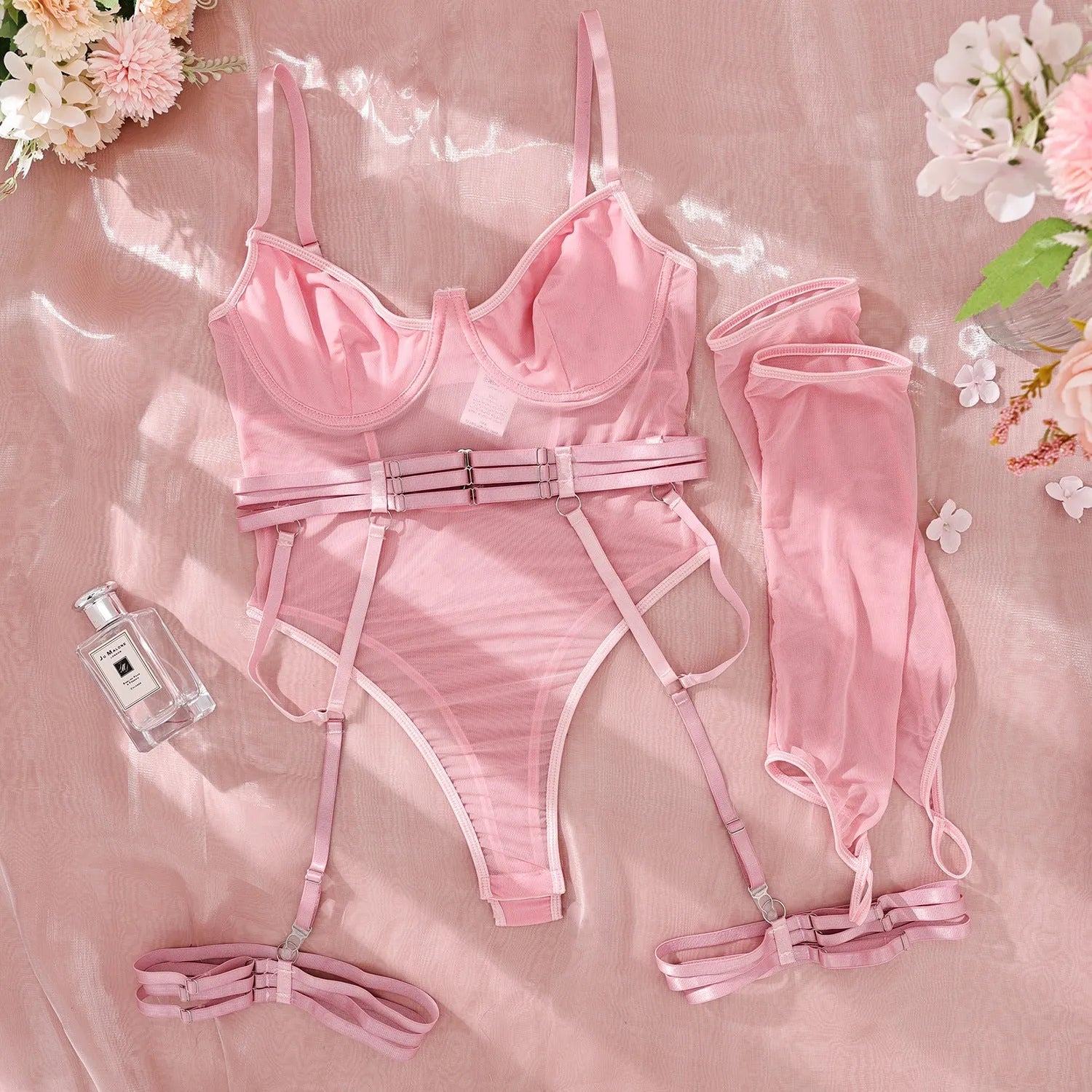 Women's transparent black mesh jumpsuit, a one-piece tights-style garment made from polyester fabric.