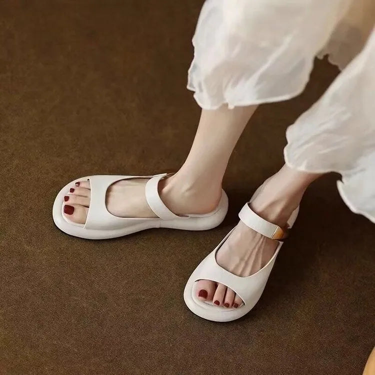 Women's apricot leather peep toe flat platform sandals on white background