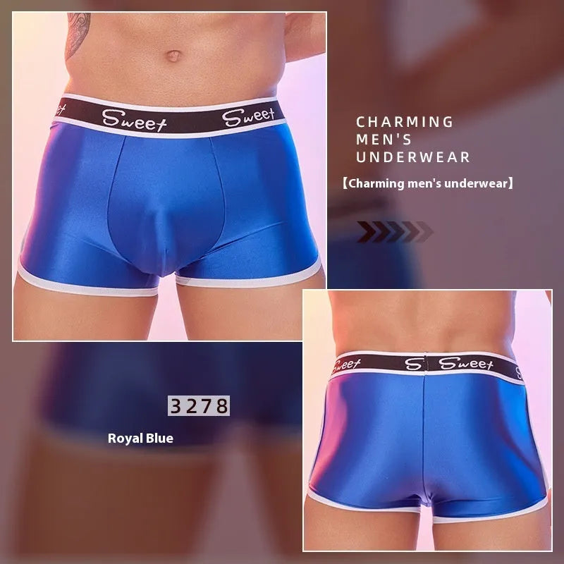 Men's silky nylon boxer shorts in black, white, and sapphire blue colours.