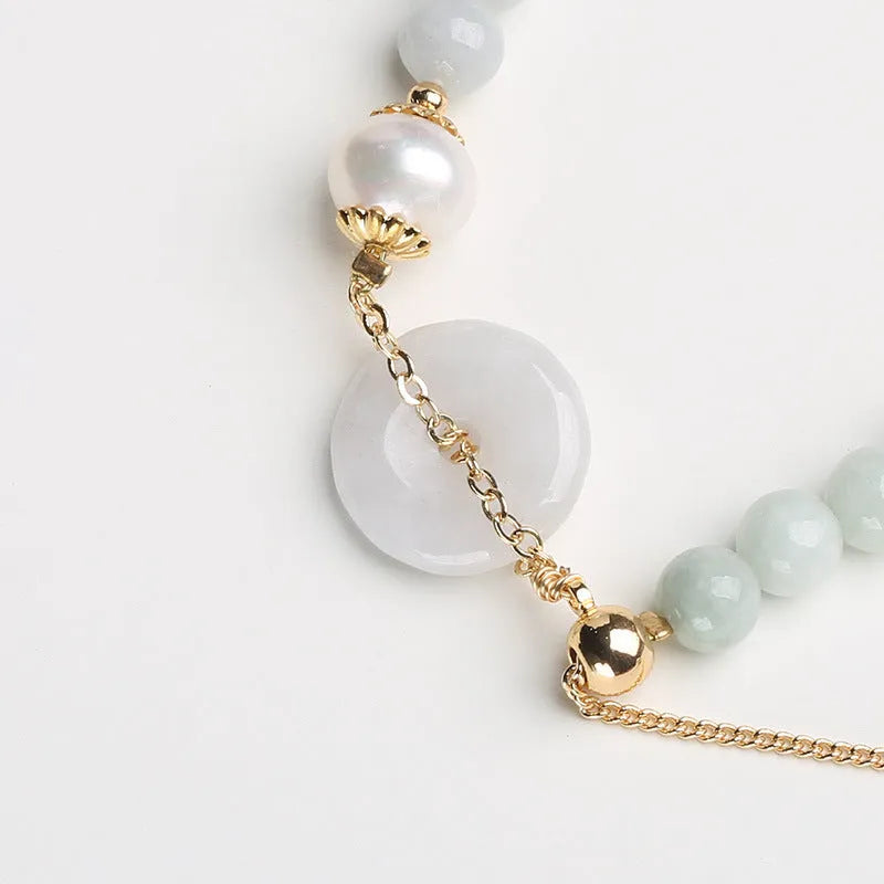 Natural jade peace buckle pearl bracelet for women with round pendant on pearl string