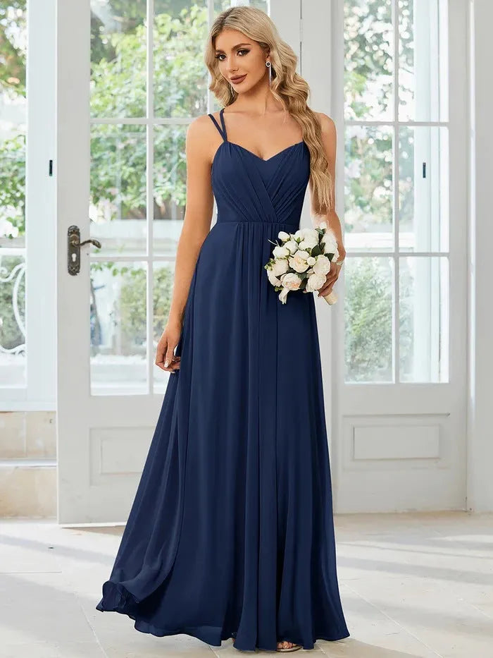 Women's sleeveless long A-line pleated dress in solid colour polyester fabric