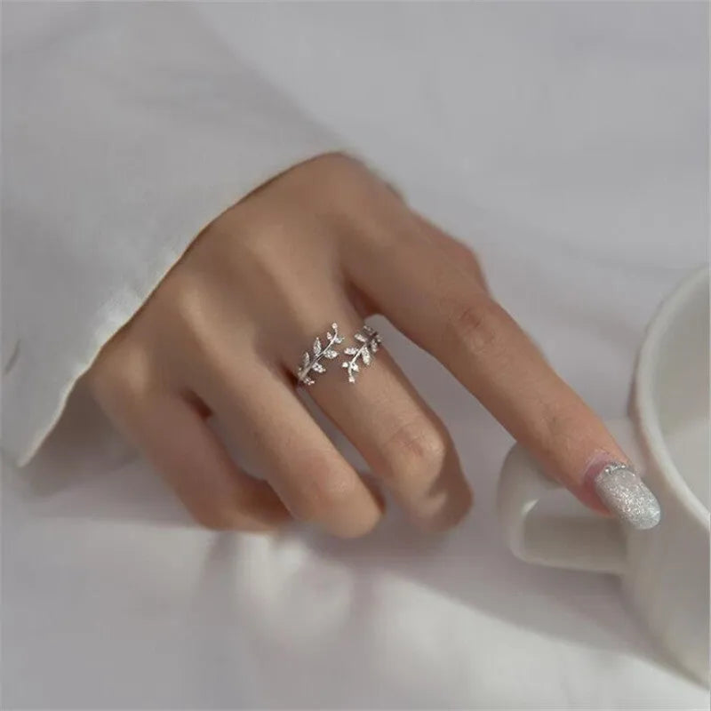 Women's copper branch ring with leaf design in silver or gold electroplated finish