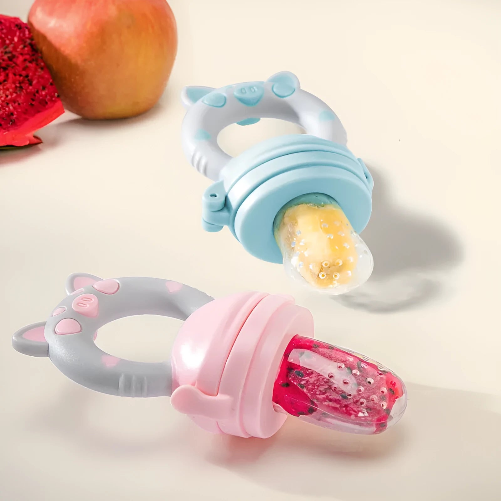 Soft silicone baby teether in blue, green, or pink colour options.