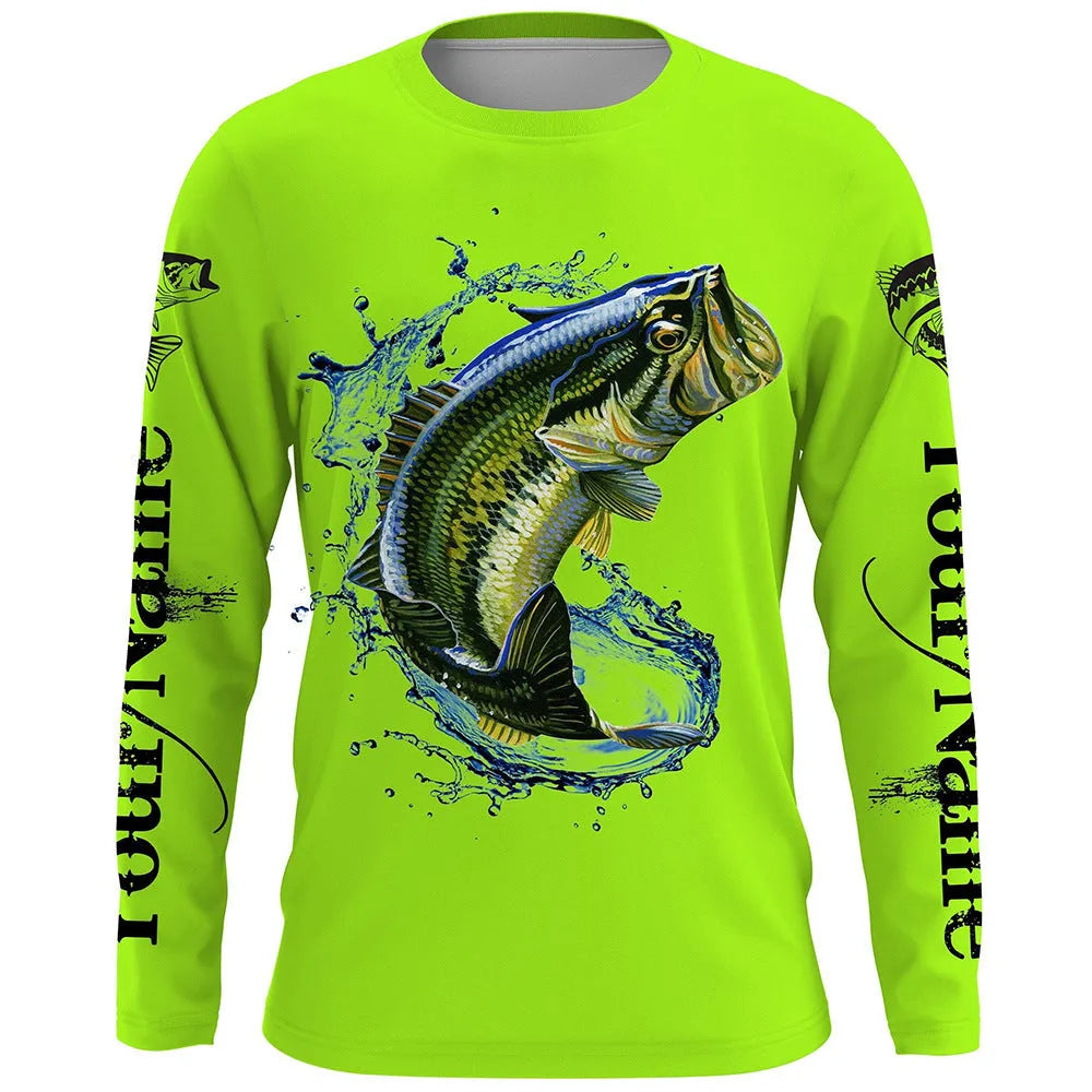 Man wearing a grey pullover with a detailed all-over blue fish print design, round neck, and long sleeves.